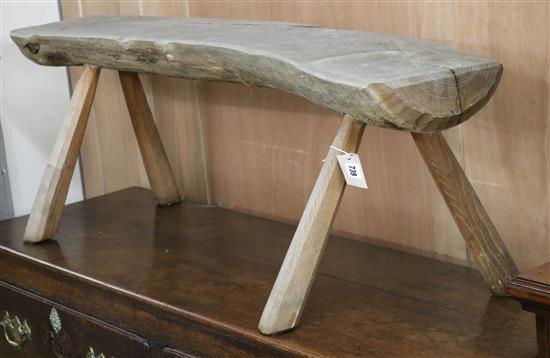 A rustic stool W.120cm